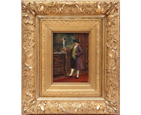 Jean Baptiste Madou (1796-1877)Interior with a gentleman with a statue in his hand, standing by a chest of drawers in front o