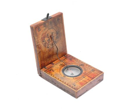 Asian sundial/compass in wooden case decorated with text, ca. 1920, 6x4.5 cm