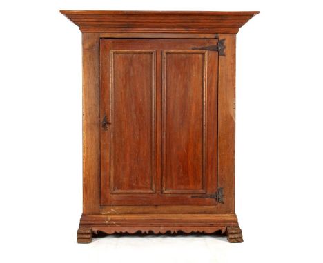 Solid oak cabinet with panel door and standing on slippers, Holland 18th century, 154 cm high, 129 cm wide, 67 cm deep