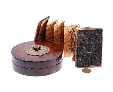 Pustaha magic book, made of wood and bark, origin Batak Sumatra Indonesia, 13.5x9 cm, stored in a round coromandel wooden lid