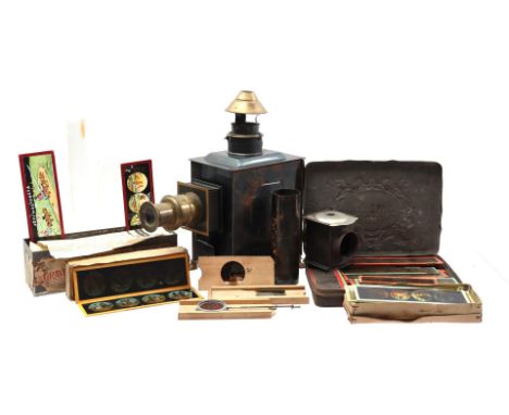 Jean Schoenner magic lantern in matching box with various accessories and approx. 80 slides, Germany approx. 1900 (rust)