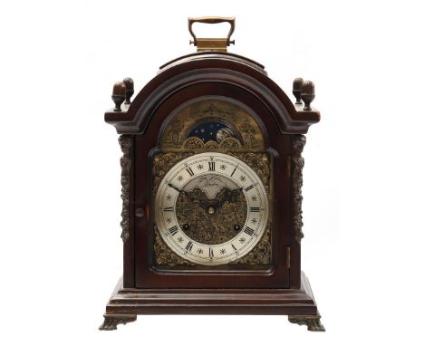 Hermle table clock with moon phase in walnut case, John Taylor London, 30 cm high