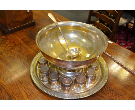 A Sheridan Silver Plated punch bowl, ladle and twelve beakers;  associated tray