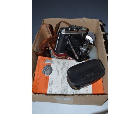 A German Zeiss Nettar camera and assessories
