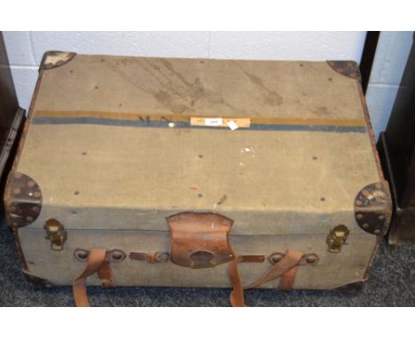 An early 20th century Scottish leather mounted travelling trunk, by Cleghorn, George Street, Edinburgh, fitted with a lift ou