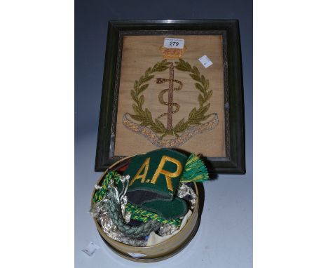 World War II - an ARP rm band;  a Royal Army Medical Corps tapestry;  other badges
