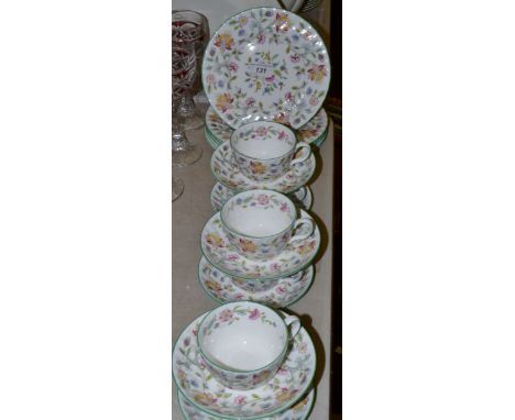 A set of six Minton Haddon Hall teacups, saucers and side plates
