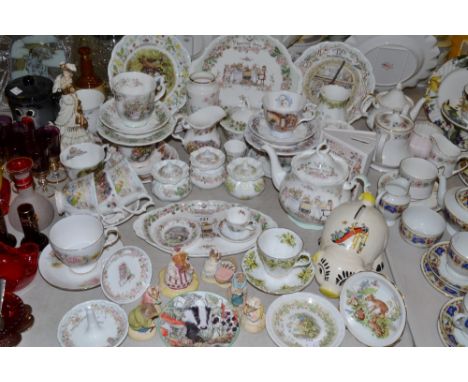 A Royal Doulton Brambley Hedge tea service;  wall clock;  money box;  models;  dessert plates;  etc