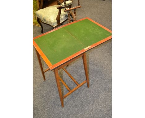 An Edwardian mahogany and satinwood inlay card table 