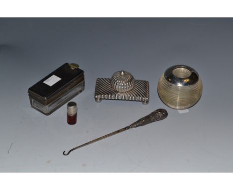 A small silver mounted ruby glass scent bottle, Birmingham 1895; a match striker; inkwell etc (5)