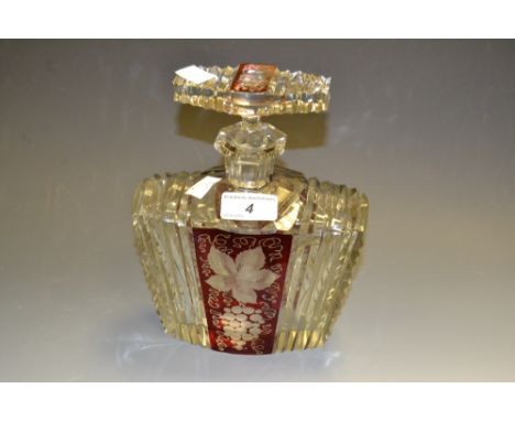 A 19th century Bohemian clear and ruby flashed glass decanter, the ruby panel etched with grapes and vines, unmarked, 21cm hi