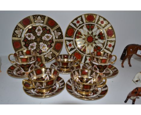 A pair of Abbeydale Chrysanthemum pattern breakfast cups and saucers; three similar teacups and saucers; a pair of dinner pla