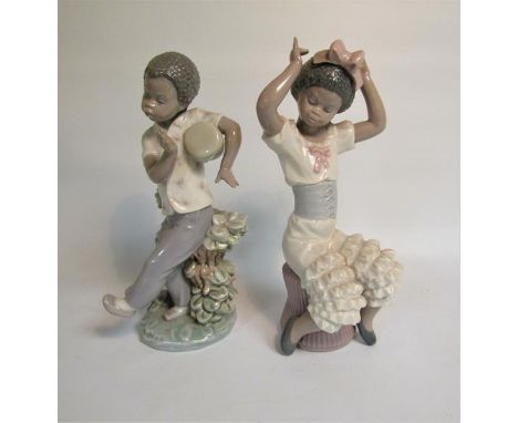 Two Lladro porcelain figures - Rumba, model no.5160 and Bongo Beats, model no.5157, each 23cm h. 