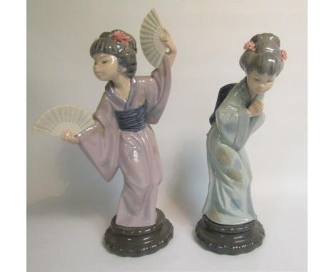 Two Lladro porcelain figurines - Madame Butterfly, model no.4991 and Sayonara, model no.4989, each approx 27.5in h. 