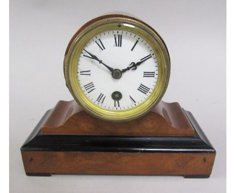 A late 19c walnut mantel clock with ebonised base moulding and drum head case.  The movement no.85432 with white enamel dial,