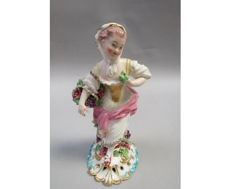 A patch marked Derby figure of a lady with a basket of grapes, supported on a pierced scroll base, possibly Autumn from a set