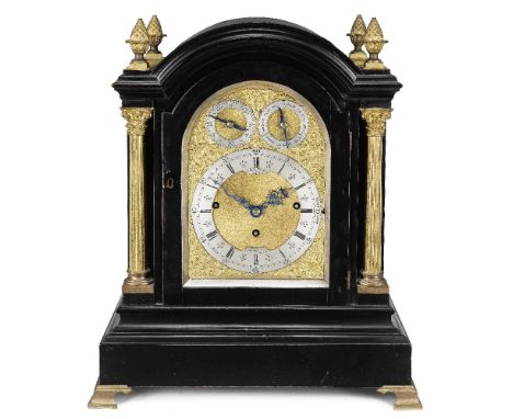 A late 19th century ebonised quarter chiming table clockCharles Frodsham, 84 Strand London, No. 1923The arched case with four