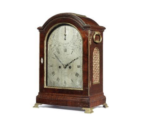 A mid-19th century brass-bound mahogany single pad top clockJohn Leumas, LondonThe case surmounted by a brass bound pad above