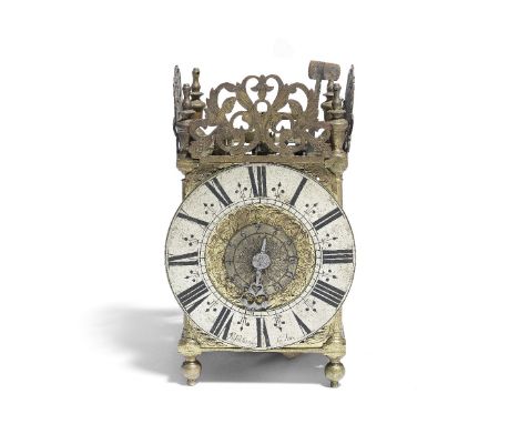 A late 17th century brass lantern clock with verge escapementJoseph Williamson, LondonThe frame with its bell and spider now 