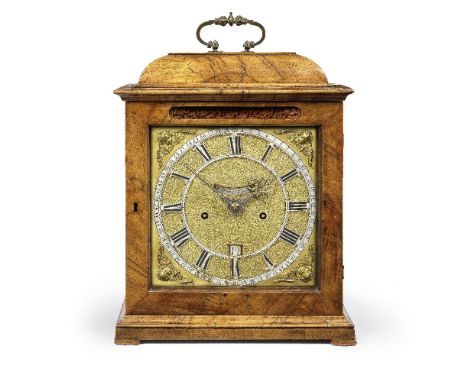 A walnut table clockThe movement late 17th century, the dial and case laterThe movement with tall rectangular plates measurin