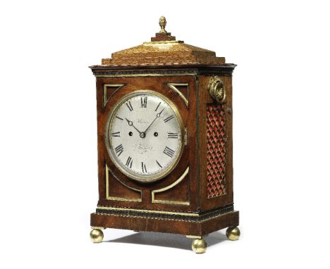 A late 19th century brass bound mahogany table clock with rare shaped platesHaines and H. KnightThe case surmounted by a smal