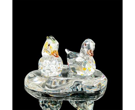 Part of the Feathered Beauties collection. Beautiful lead crystal ducks made with colorful crystal, gracefully sitting on a r
