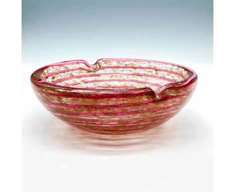 Clear glass exterior with a swirling pink and gold interior. A superb piece of opt art blown glass. Dimensions: 5.75"W x 2"HC