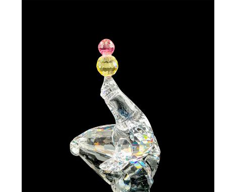 Part of the Cheerful Times theme group. Lead clear crystal seal playfully juggling two crystal balls on its nose. Swarovski e