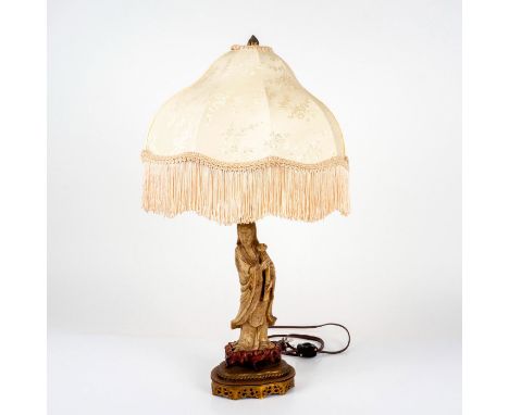 Antique chinoiserie table lamp with soapstone sculpture and intricately carved wood and brass base. Sculpture is beautifully 