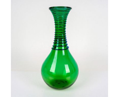 Tall art glass vessel in a green coloration with applied cobalt blue spirals at the neck. Dimensions: 6.75"W x 15"HManufactur