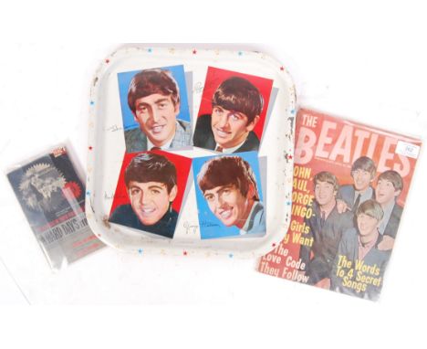 A collection of assorted vintage 1960's Beatles memorabilia. Comprising of: a vintage ' Made In Great Britain ' tin tray depi