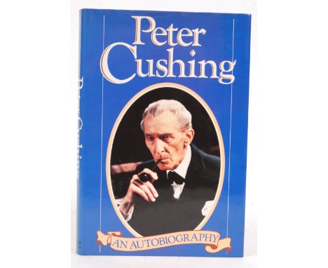 Peter Cushing - An Autobiography. First edition, 1986. Signed to the title page by Cushing in blue ink. Dedicated. With dust 