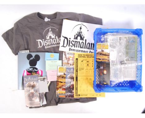 A large collection of items related to Bansky's Dismaland Bemusement Park in Weston Super Mare 2015. Comprising of; an offici