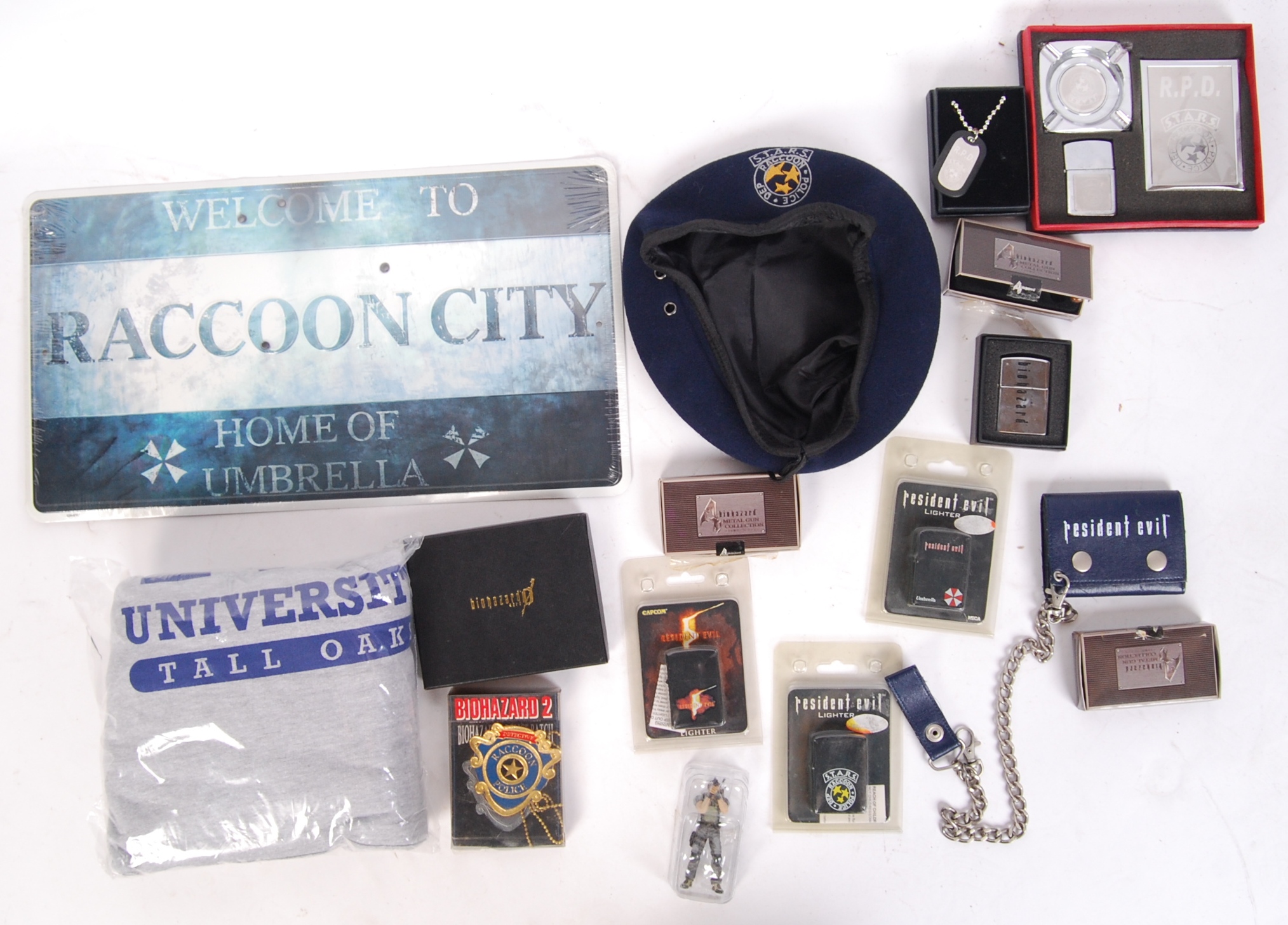 A collection of various branded loose Resident Evil replica props ...