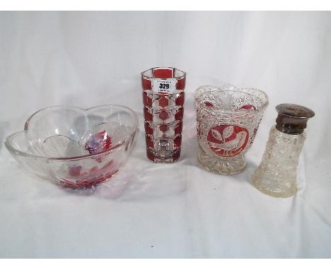 A collection of good quality glassware to include a cylindrical ruby and clear cut glass, a fruit bowl with a floral design, 