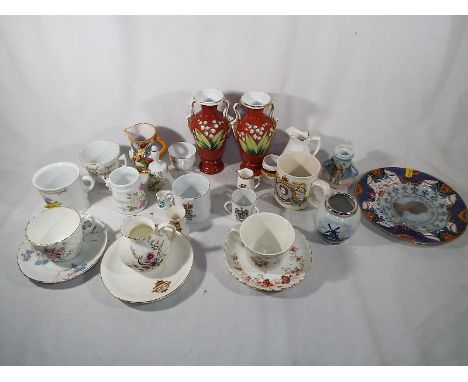 A shelf lot of good mixed ceramics to include Royal Commemorative, crested ware, and an unusual whistle cup the handle in the