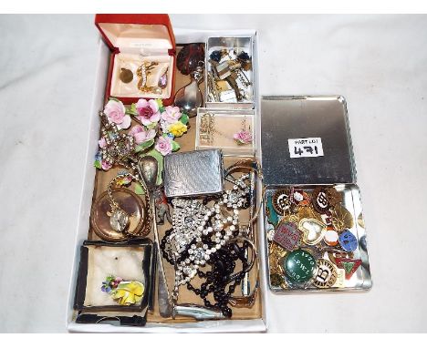 A collection of vintage costume jewellery, and a Farrahs toffee tin containing a quantity of pin badges and similar (2)