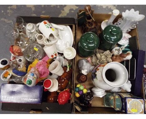Two boxes containing a good mixed lot of ceramics and glassware to include ornaments, ceramic storage jars, vase, ceramic clo