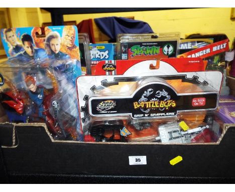 A collection of predominantly sealed blister packs to include Fantastic light up Human Torch, Battle Box, Spawn, Angry Birds 