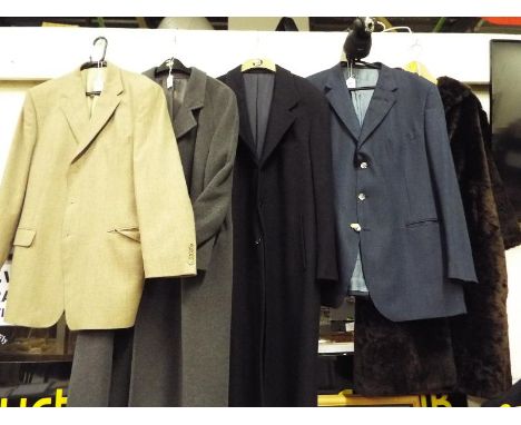 A collection clothing to include a vintage faux fur coat, a man's C&A over coat, two M & S wool jackets and a man's black ove