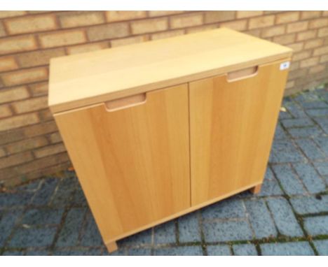 A modern light wood cabinet 74cm (h) x 80cm (w) x 43cm (d)