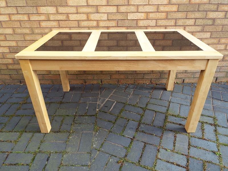A Modern Light Wood Dining Table With Black Granite Inserts Lot 110a A Modern Light Wood Dining Table With Black Granite Inserts Approximately 74 Cm