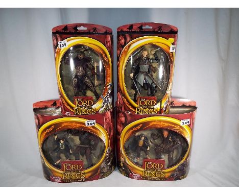 Lord of the Rings - a collection of 4 mint in box Lord of the Ring figures to include The Two Towers, Grishnakh, Merry, Easte