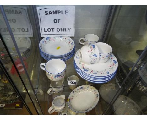 A collection of approximately 36 pieces of Royal Doulton Windermere china to include side plates, bowls, cups, saucers and si