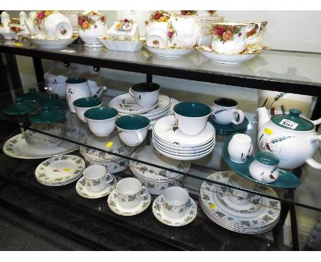 A collection of approx 36 pieces of ceramic tableware by Denby decorated in the Green Wheat pattern
