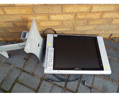 A 20 inch flat screen Wharfedale television with remote and wall bracket.