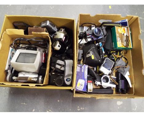 Two boxes containing a collection of cameras to include a Zenith XP, a Pentax ES, Canon mega zoom 105 and similar (2)