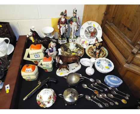 A good mixed lot to include a pair of ceramic soldiers, a quantity of good quality collector plates, ceramic horses and an Ar