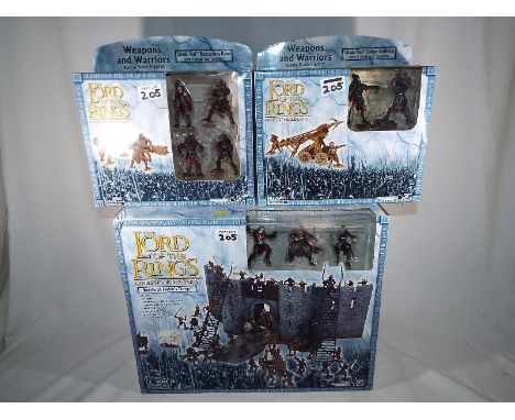 Lord of the Rings - 3 mint in box Lord of the Ring Armies of Middle-Earth to include Battle of Helm's Deep, 2 packs of weapon