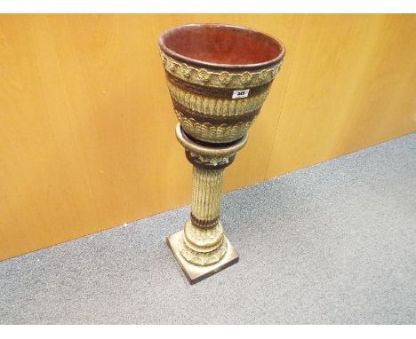 An mid period ceramic jardiniere on support 81cm (h) 